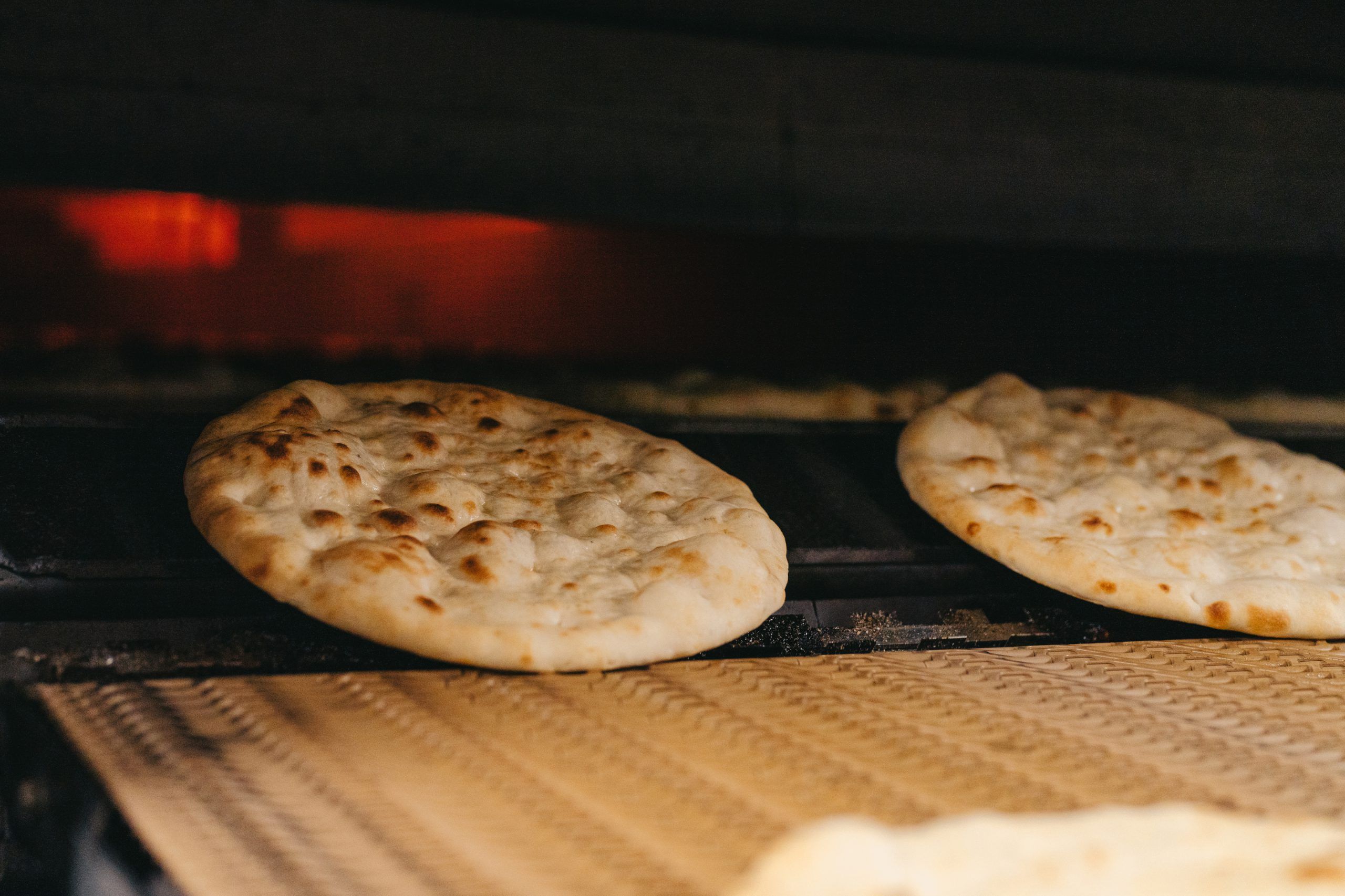 Pizza bases from the stone oven